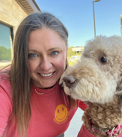 Close-up of Dr. Laska and her dog Trinity