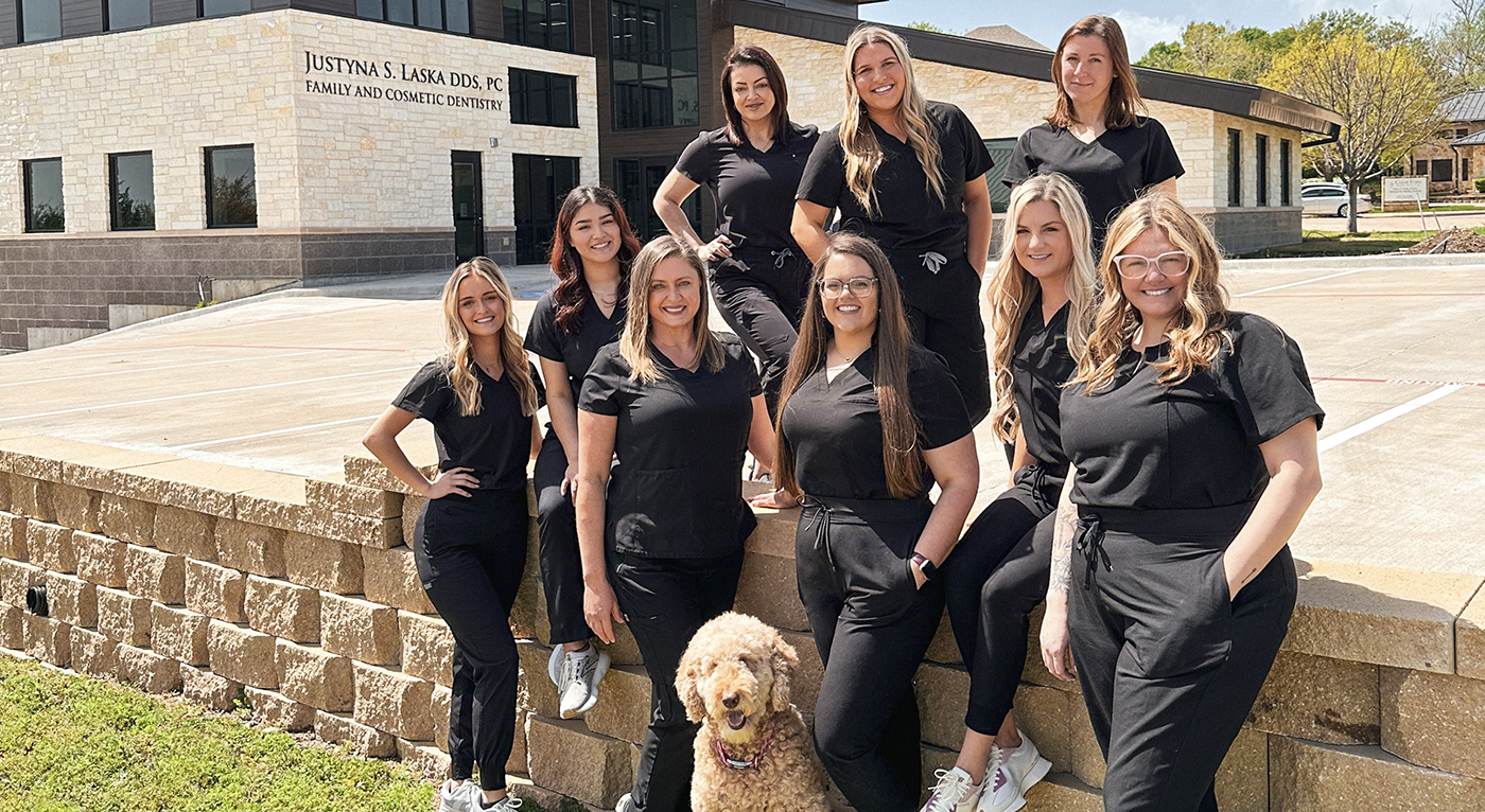 Dental team gathered outside of Fort Worth dental office